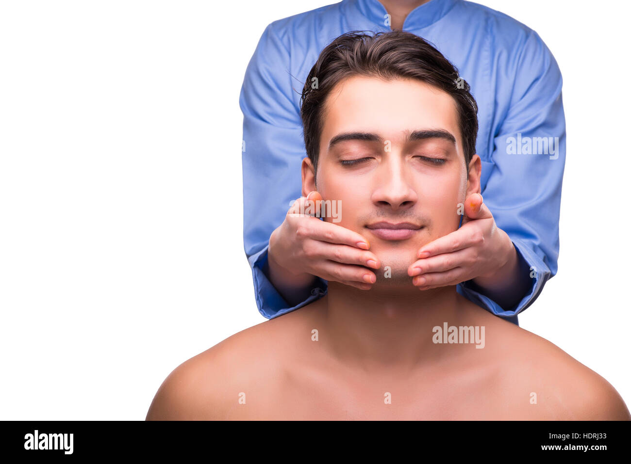 Man during massage session isolated on white Stock Photo Alamy