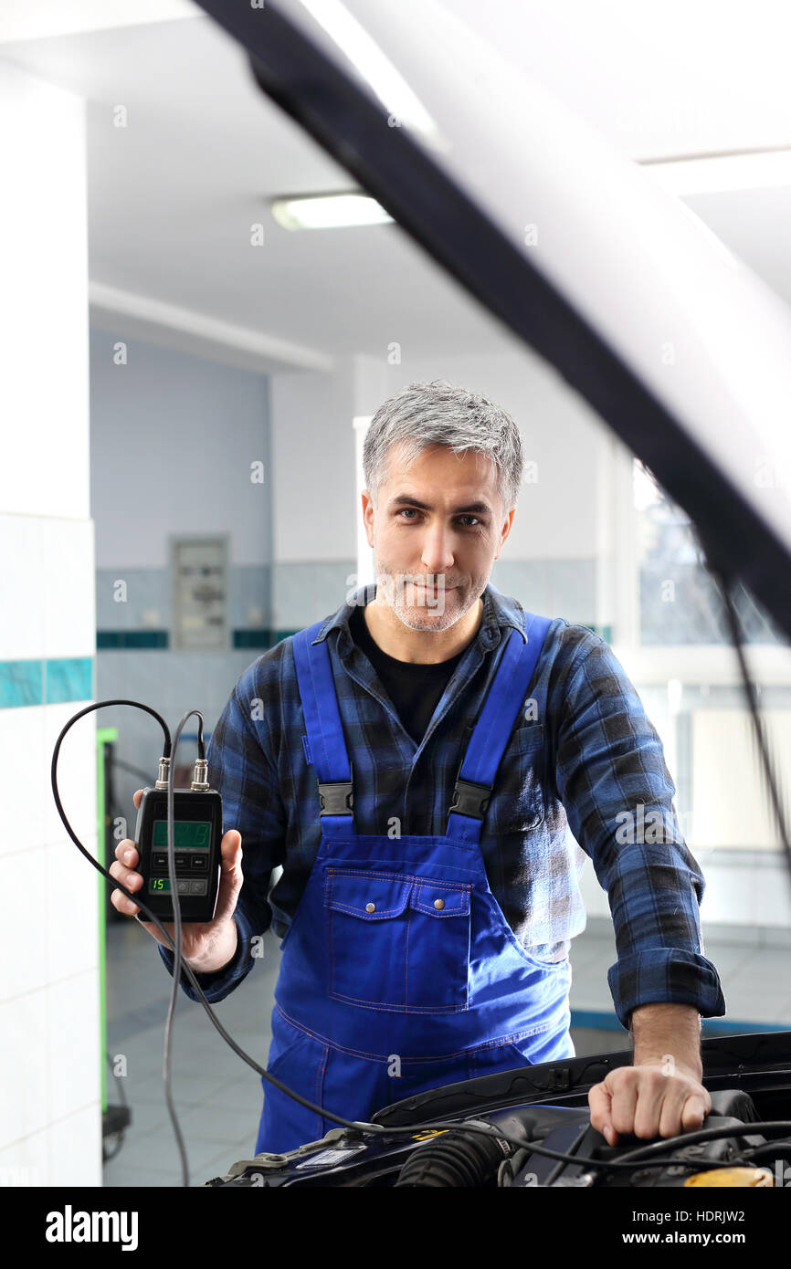 Diagnostic station, mechanic connected diagnostic computer. Technical