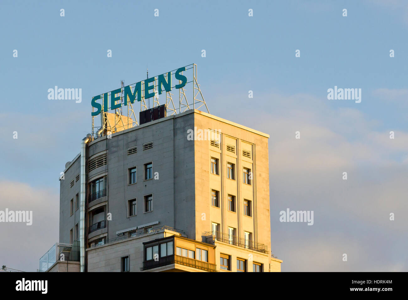 Siemens corporation logo at the top of a building in Madrid (Spain). Stock Photo