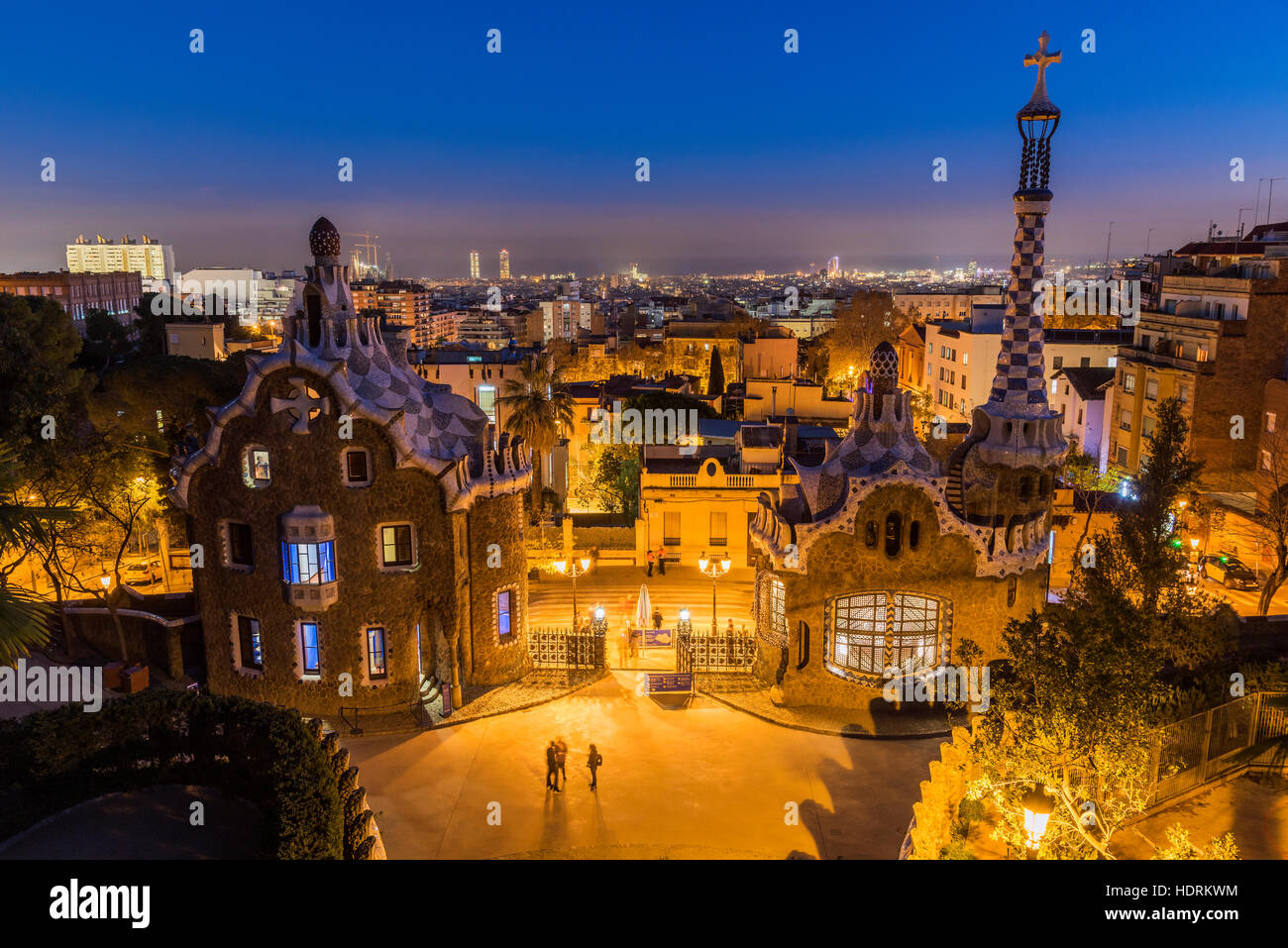 Night view of Park Guell with city skyline behind, Barcelona, Catalonia, Spain Stock Photo