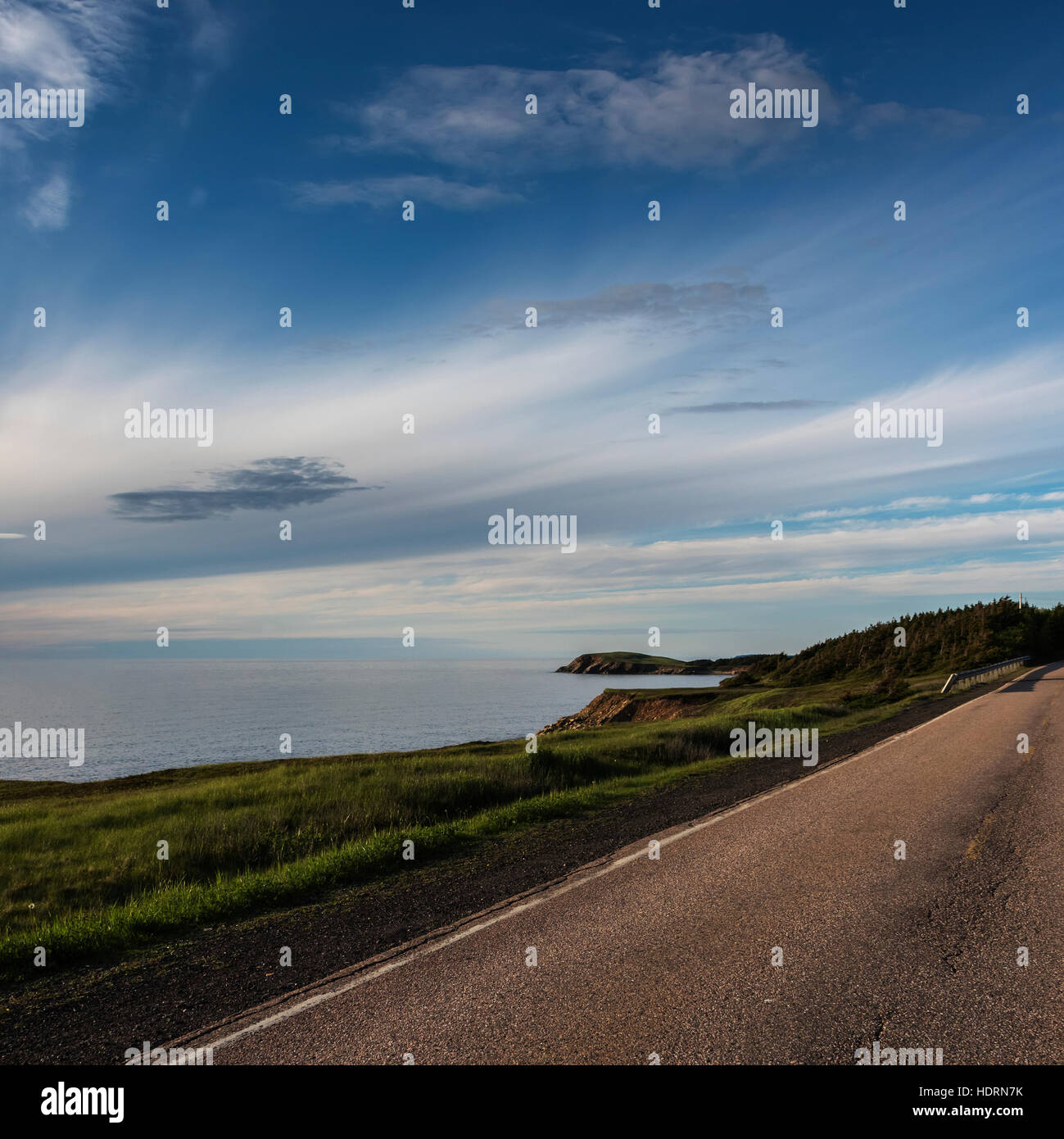 A road along the Atlantic coastline, Cape Breton Island; Nova Scotia, Canada Stock Photo