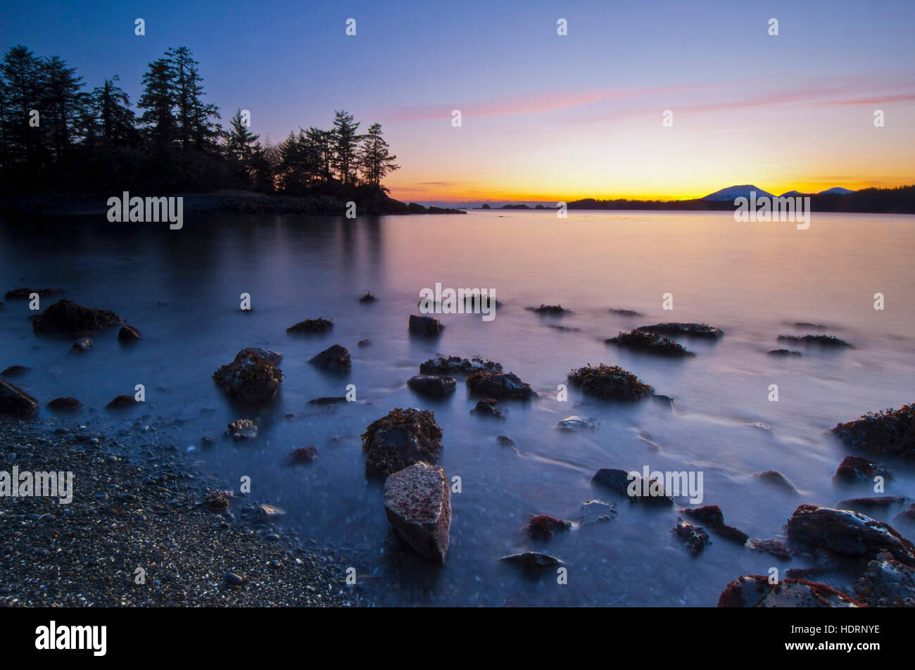 Colors of dusk and surf at Halibut Point Recreation Area with view of Magic Island
