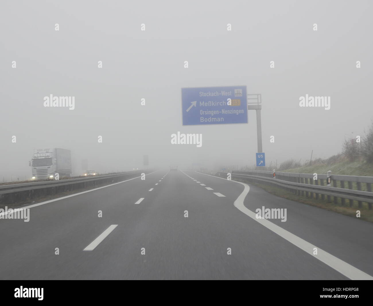Highway in fog German Autobahn Stock Photo
