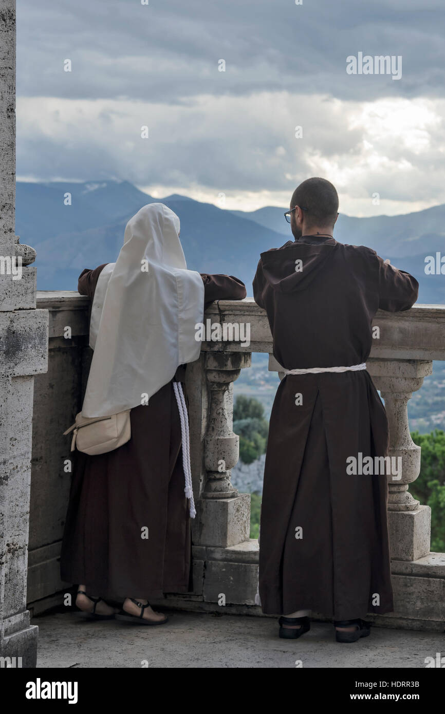 Young churchman and churchwoman on balcony оne of most known Abbeys in the world the Abbey of Montecassino, , Italy Stock Photo