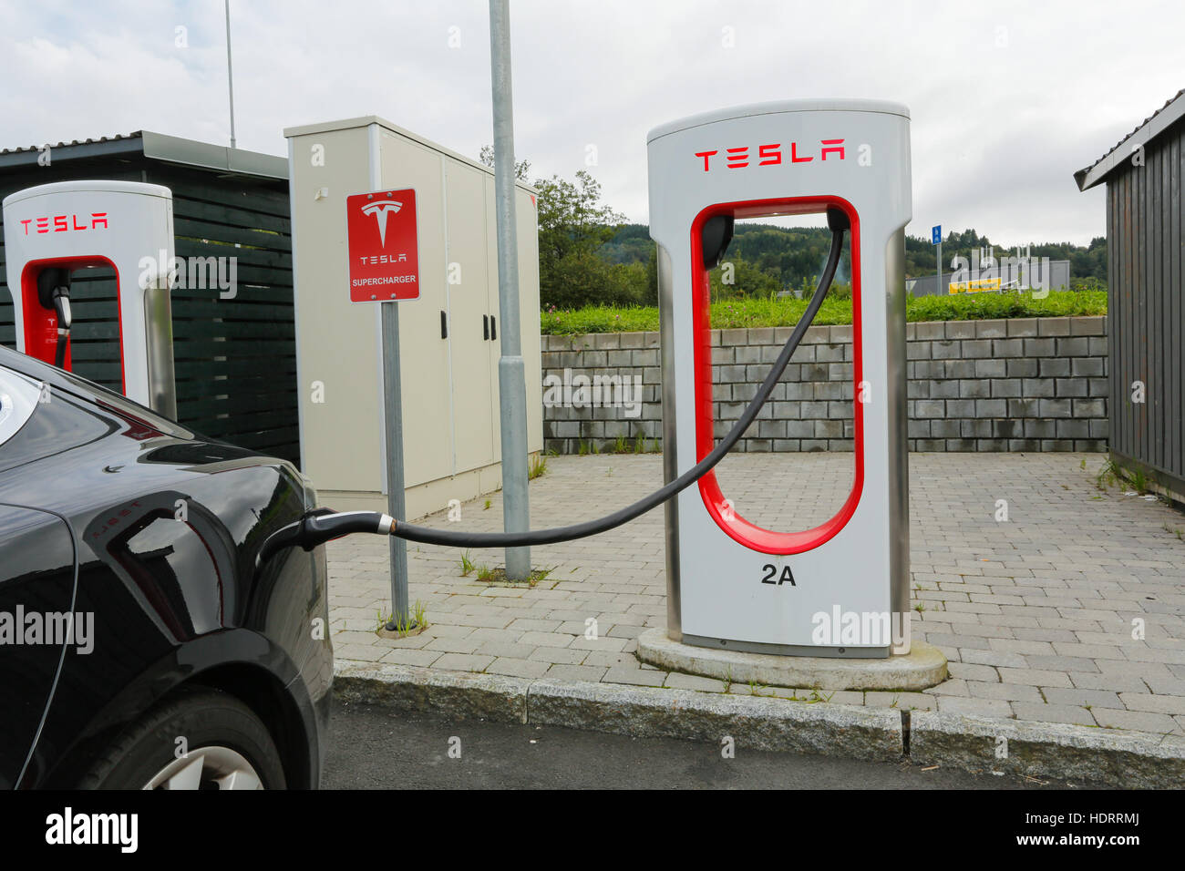 Modern Tesla electric car Supercharger station in Bergen Stock Photo