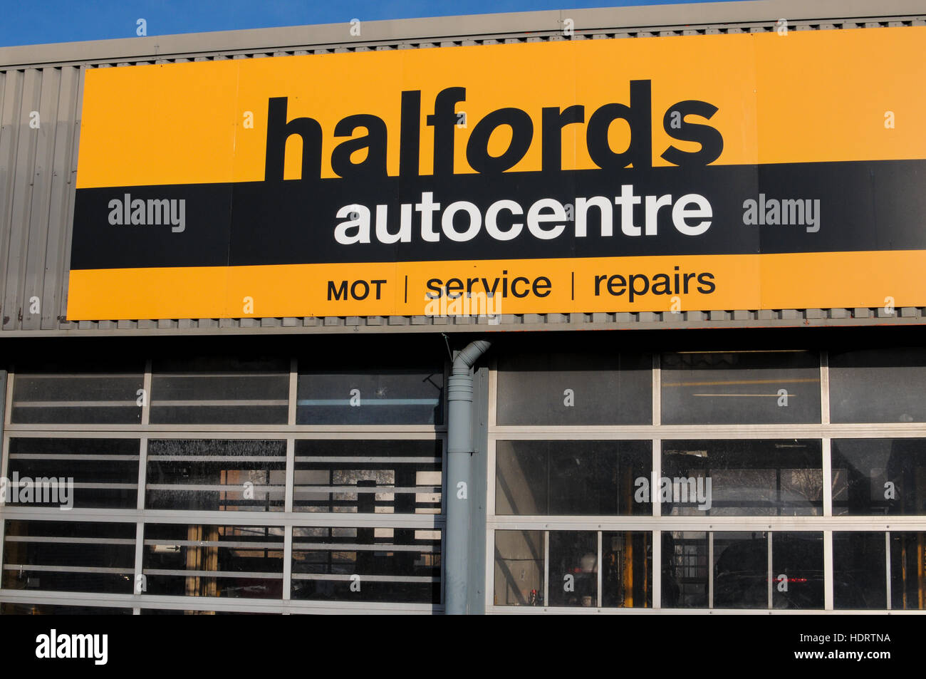 Halfords AutoCentre sign Stock Photo Alamy