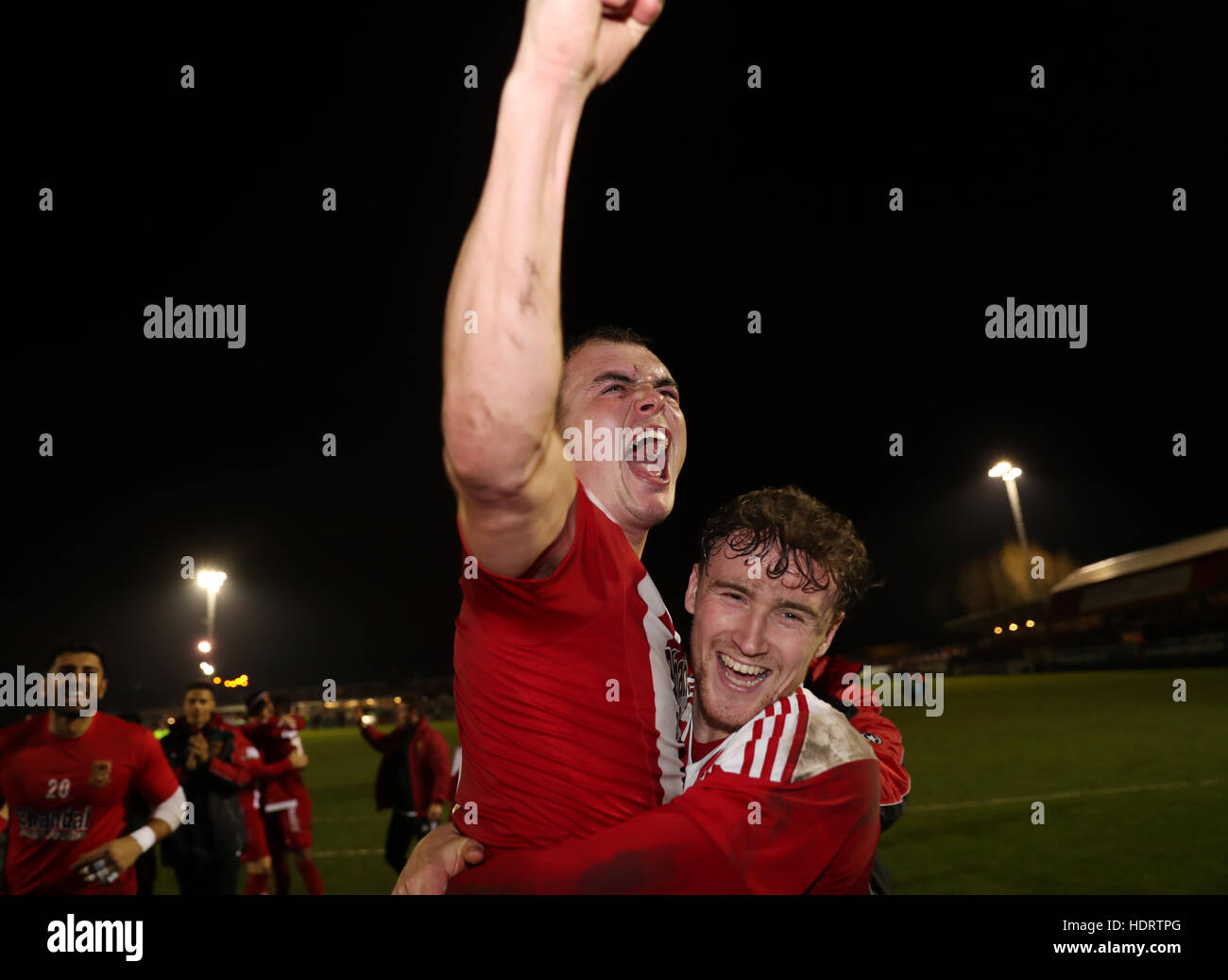 Stourbridge goal scorer Jack Duggan celebrates with Dan Scarr at the final whistle of the Emirates FA Cup, Second Round Replay at The War Memorial Athletic Ground, Stourbridge. Stock Photo
