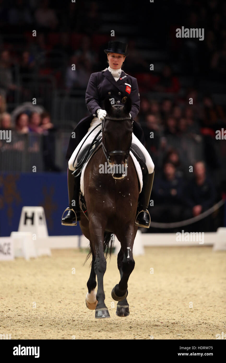 Great Britain's Laura Tomlinson riding Rosalie B competes in the FEI World Cup Dressage Grand Prix during day one of the London International Horse Show at London Olympia. Stock Photo