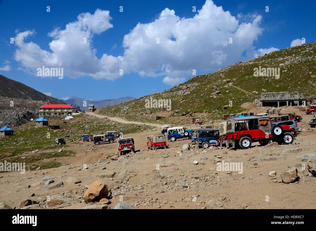 Parked American Willys jeeps in mountains around Lake Saiful Muluk North Kaghan Valley Pakistan Stock Photo