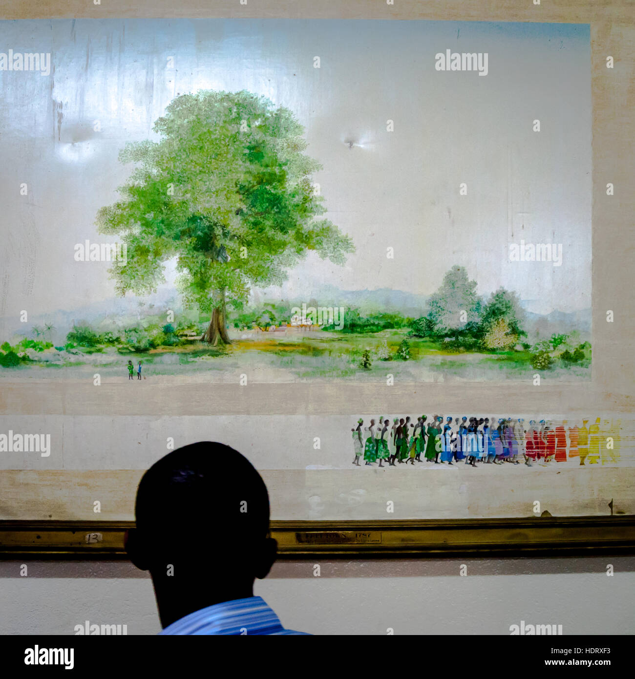 The Cotton Tree symbolizes the liberation from slavery. The giant Cotton Tree still stands in the center of Freetown. The historical painting is exhibited in the neighboring National Museum of Sierra Leone. Cotton Tree. Painting (Donation by France to the National Museum in Freetown), Freetown, Sierra Leone Stock Photo