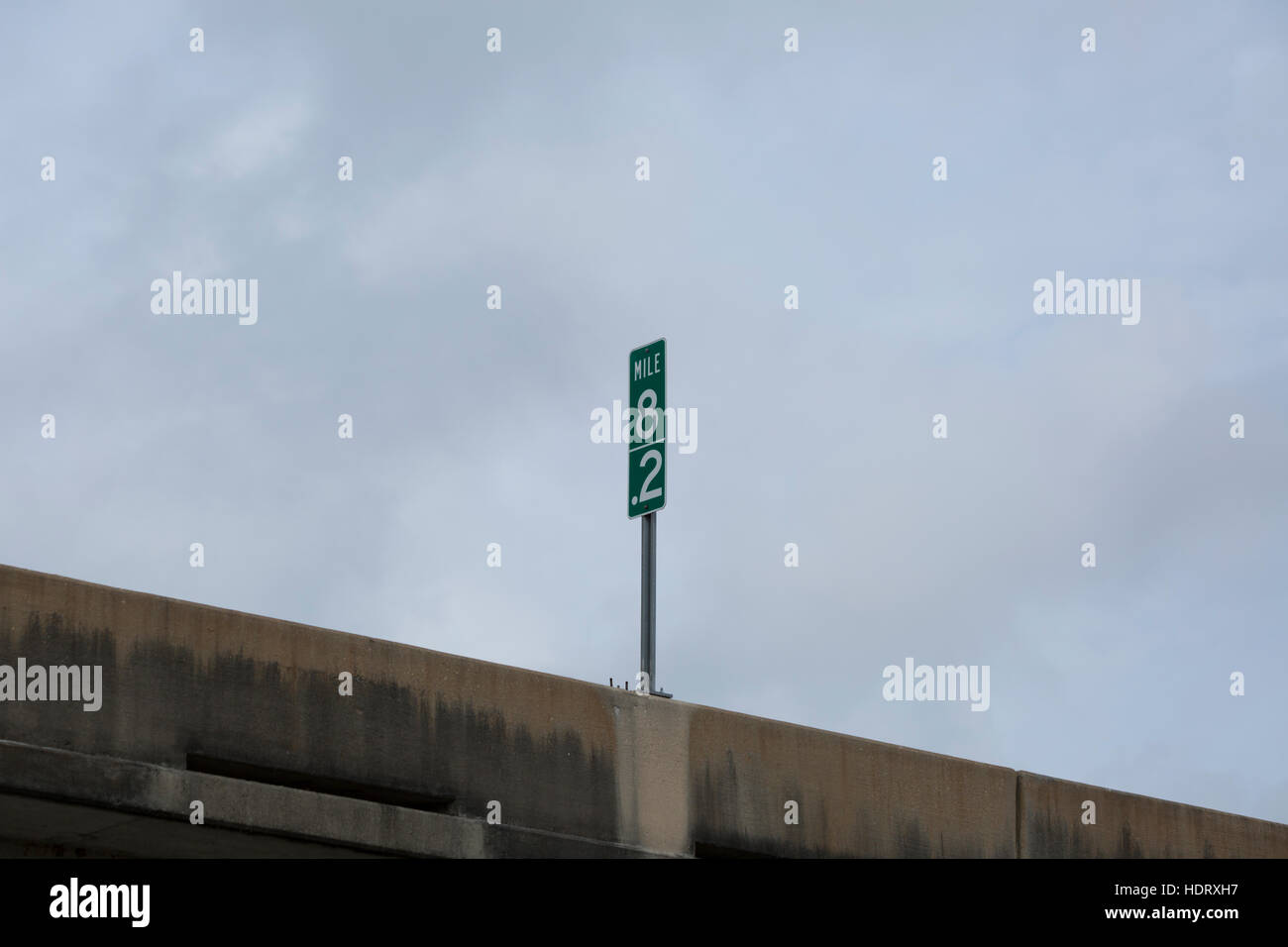 Green mile marker on Louisiana interstate Stock Photo Alamy