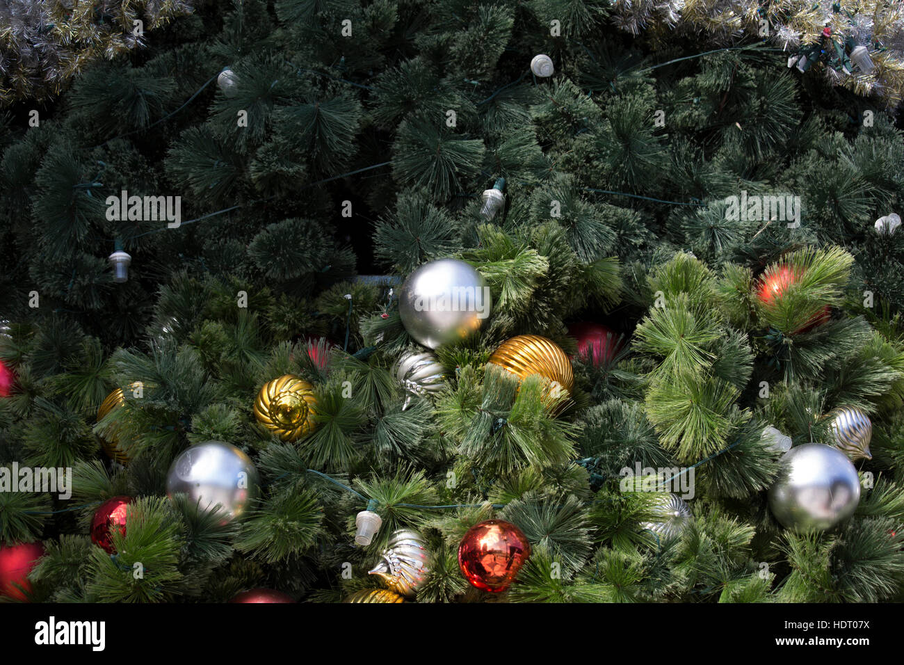 Outdoors Christmas Tree With Multicolored Decorations Stock Photo