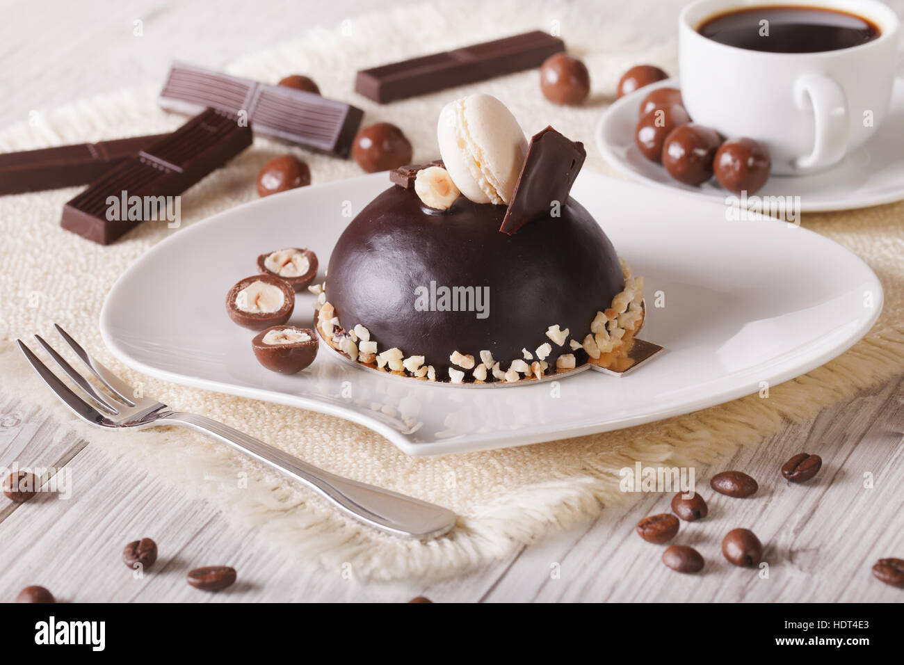 beautiful chocolate cake with hazelnut and coffee on the table. horizontal Stock Photo