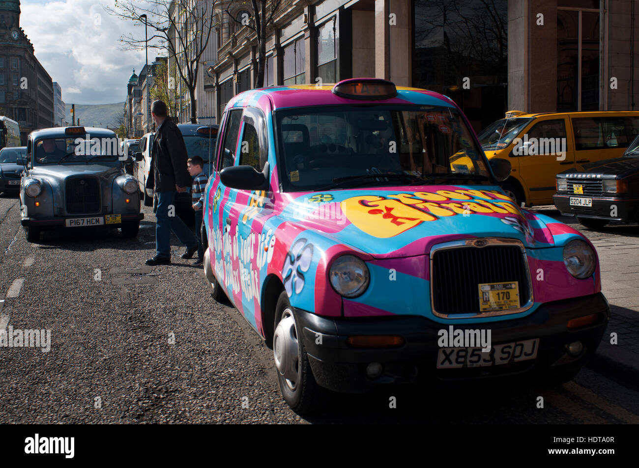 Belfast taxi cub in city center, Belfast, Northern Ireland, UK. This taxi tour will pick you up at your hotel and take you on a journey around the cit Stock Photo