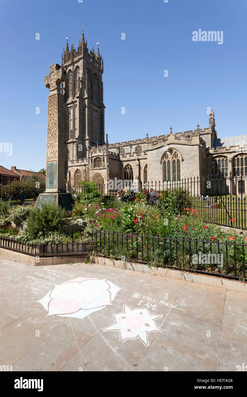 Church of St John the Baptist, and pavement artwork, High St, Glastonbury, Somerset, UK Stock Photo
