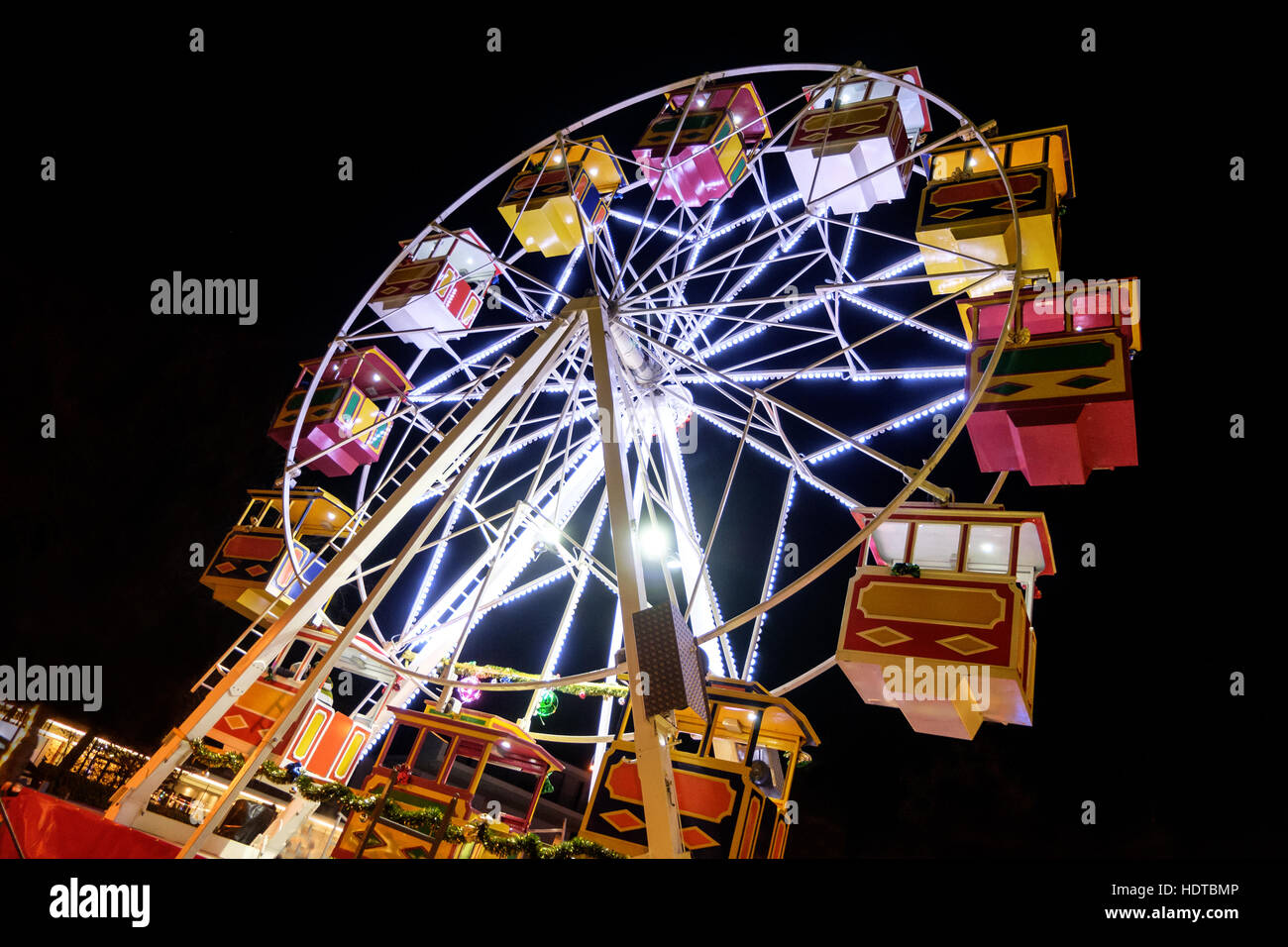 Ferris wheel at night at a Christmas fair in Velden (Austria). Lit by