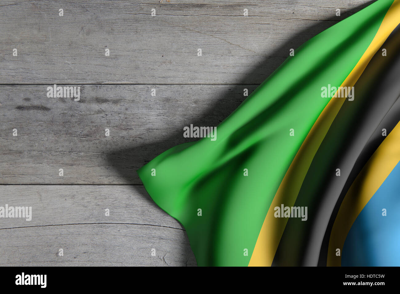 3d rendering of a Tanzania flag waving on wooden background Stock Photo ...