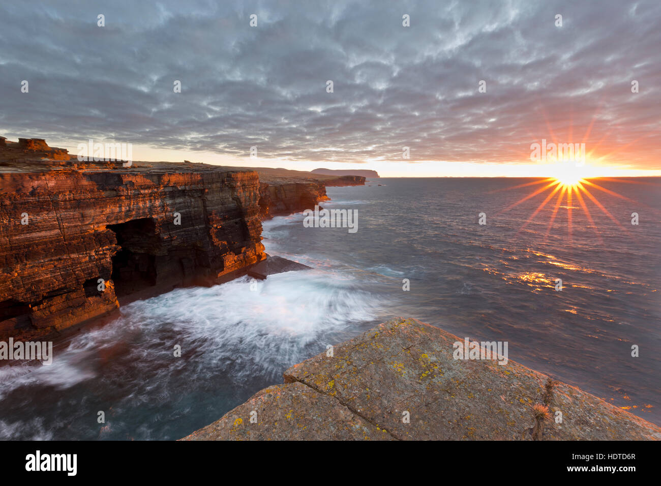 Winter sunset along the Yesnaby coast, Orkney Stock Photo