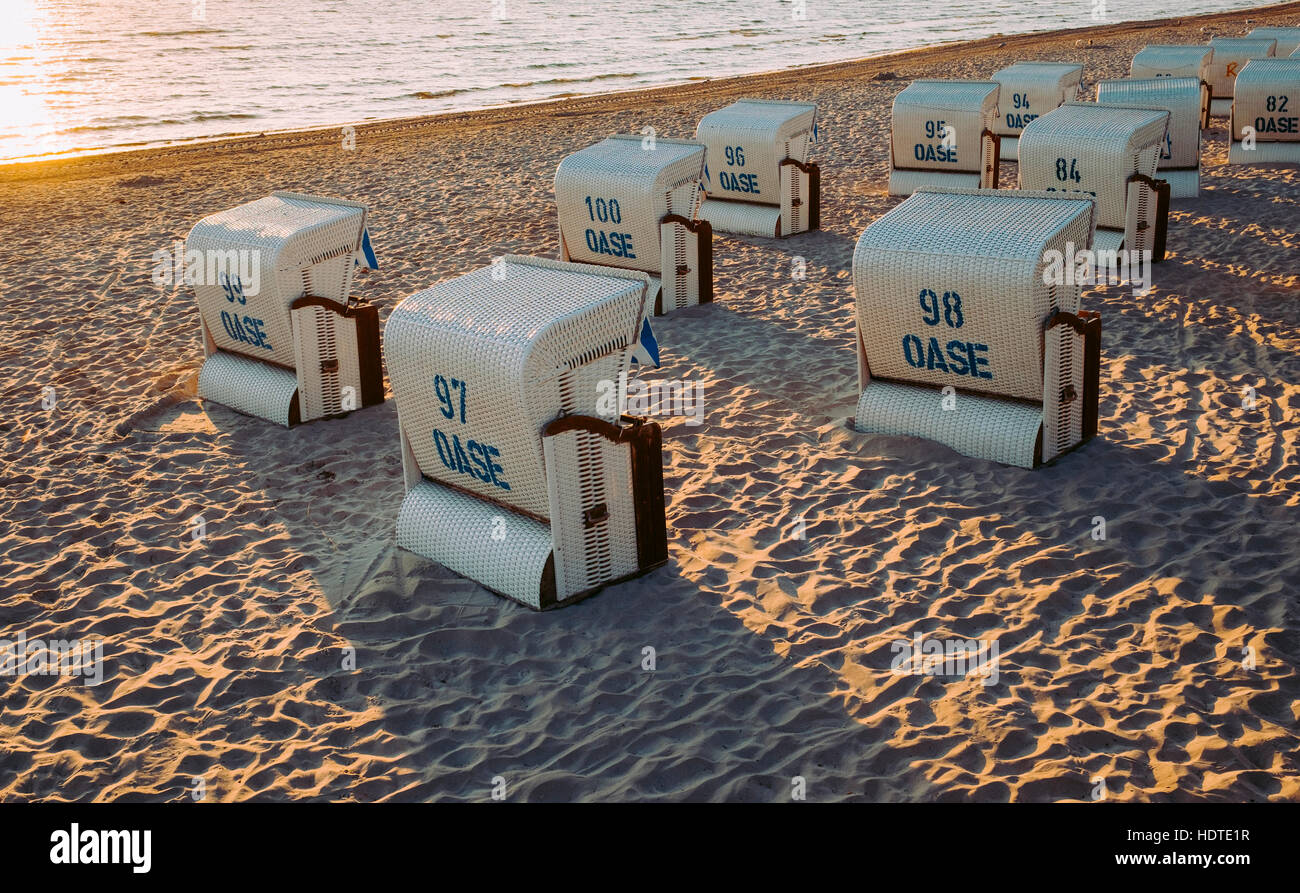 Beach chairs with long shadows, Scharbeutz beach, Schleswig-Holstein, Germany Stock Photo