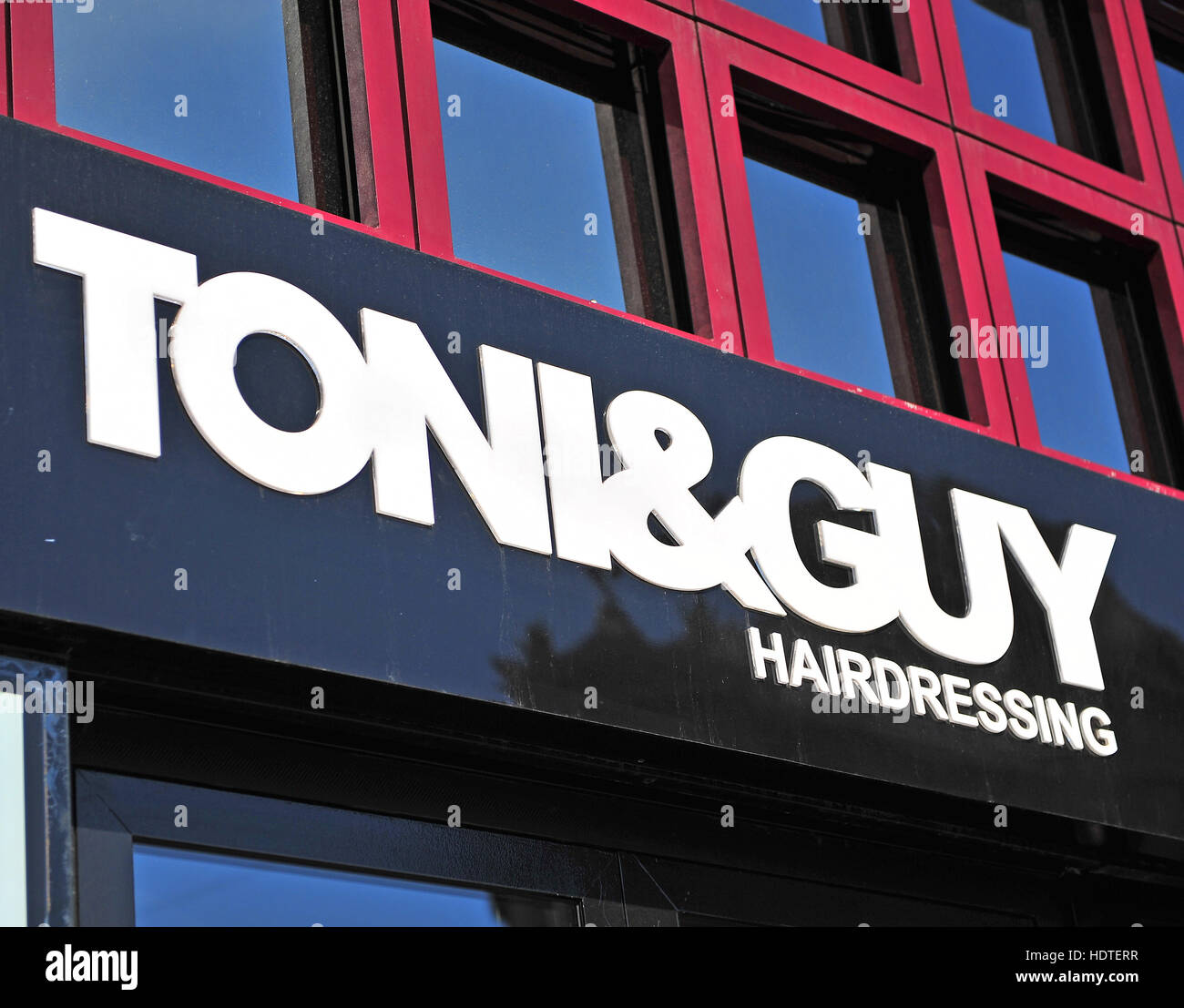 BUDAPEST, HUNGARY - JUNE 8: Logotype of Tony&Guy hairdressing salon in Budapest on June 8, 2016. DHL Stock Photo