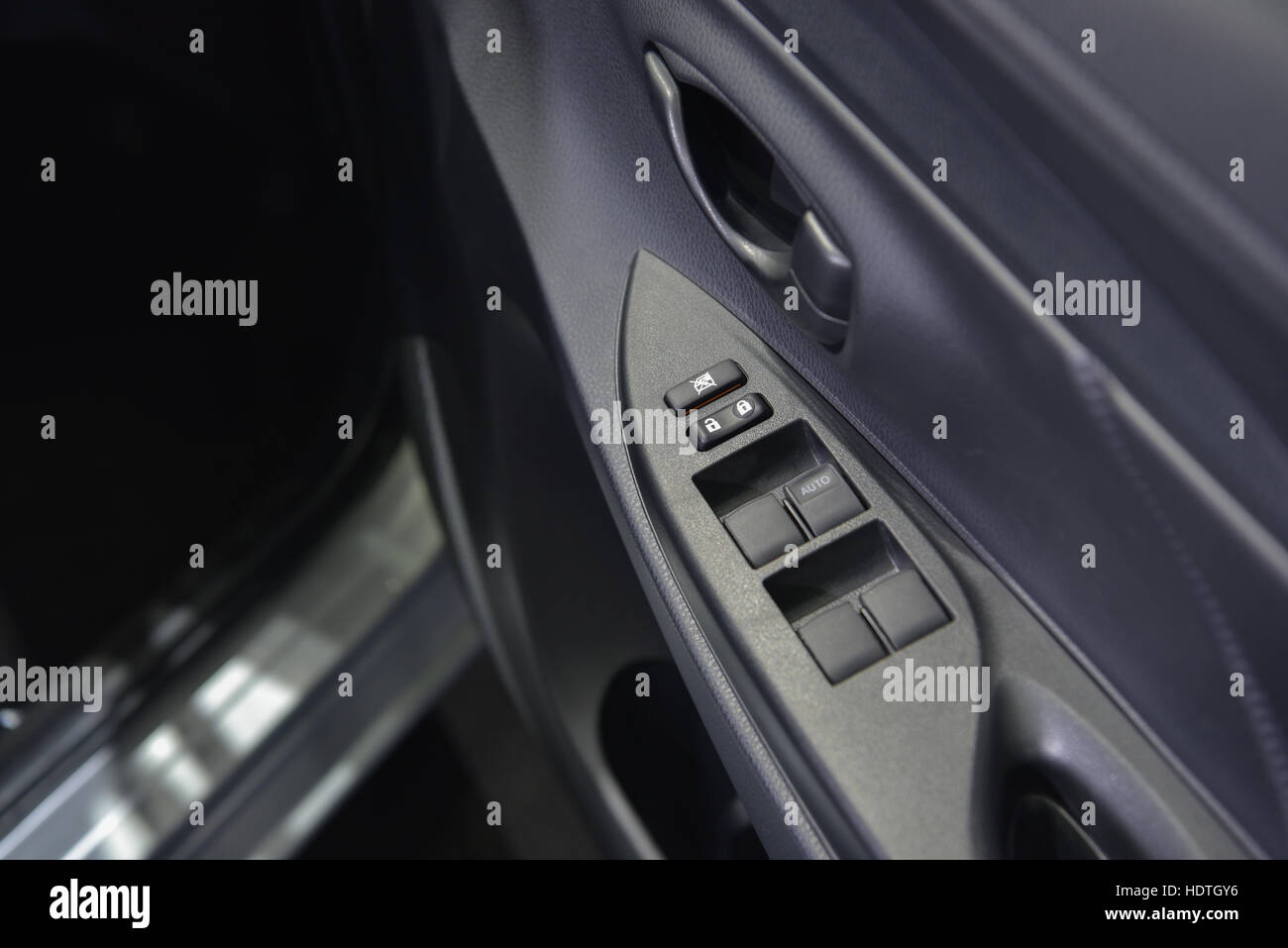 Button to locking doors in car Stock Photo Alamy