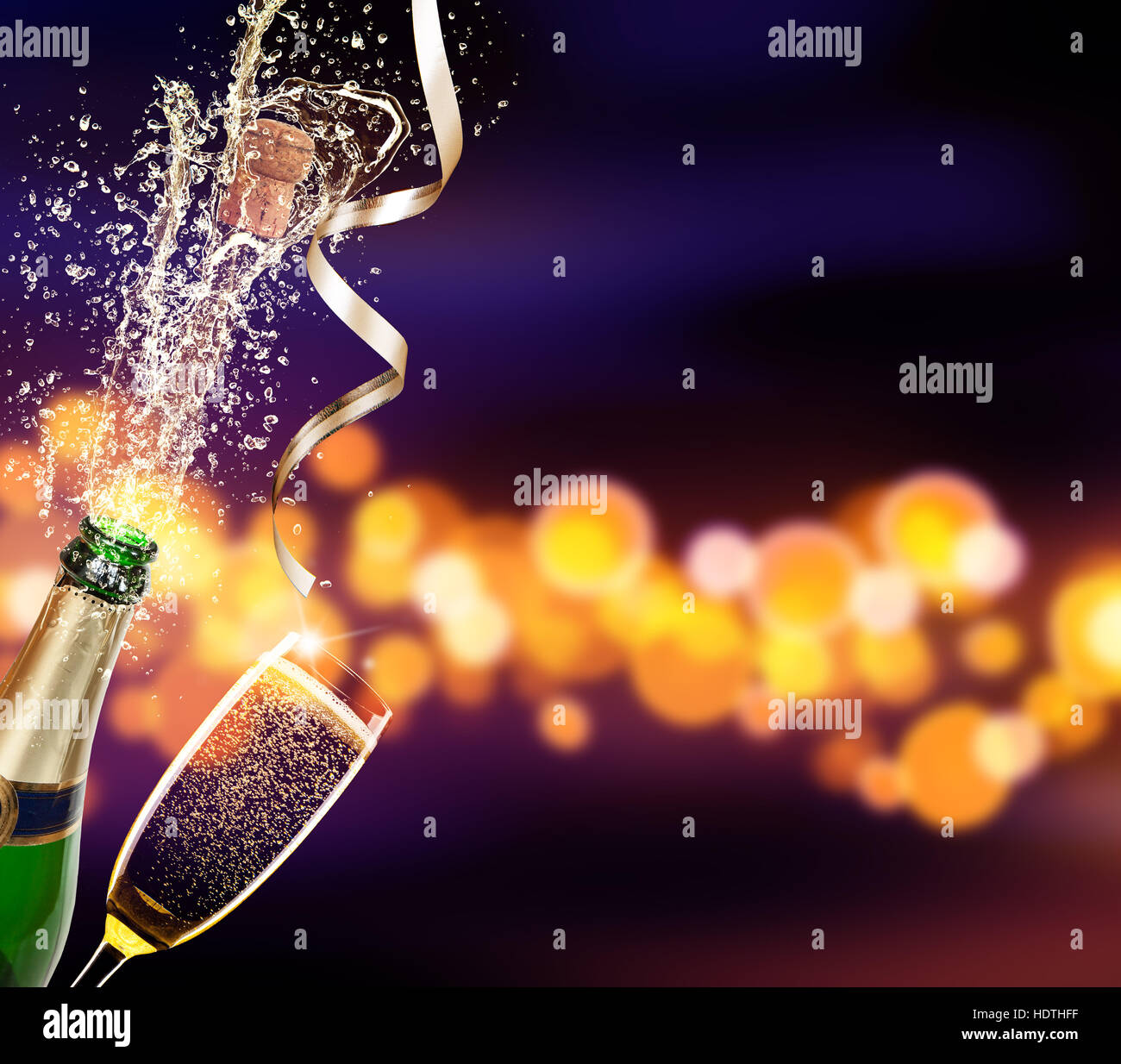 Download Splashing Bottle Of Champagne With Glass Over Blur Colored Spot Stock Photo Alamy PSD Mockup Templates
