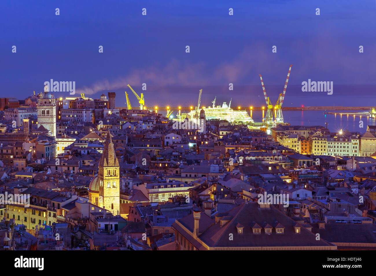 Old town and port of Genoa at night, Italy. Stock Photo