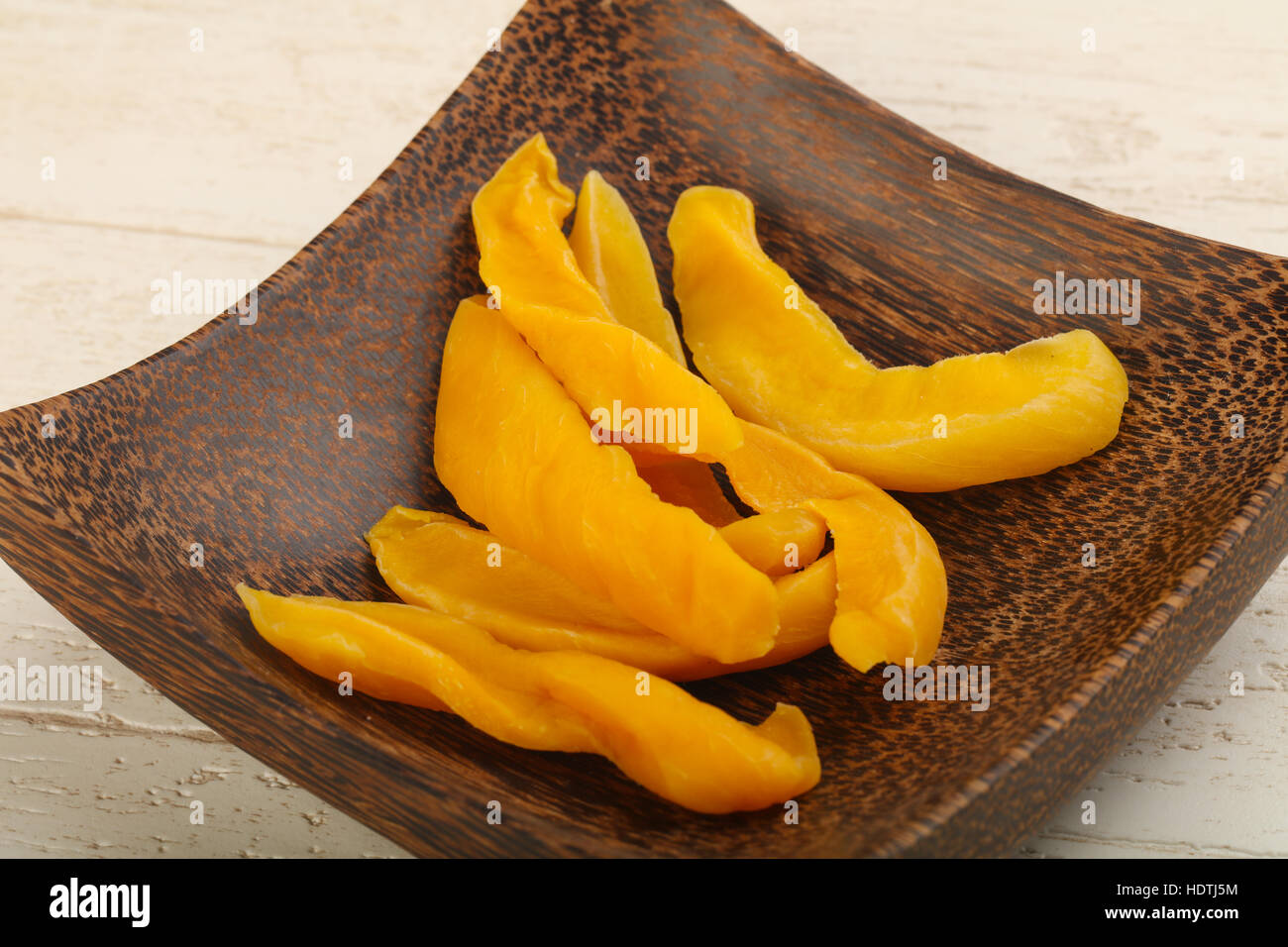 Dry mango chips heap in the bowl Stock Photo Alamy