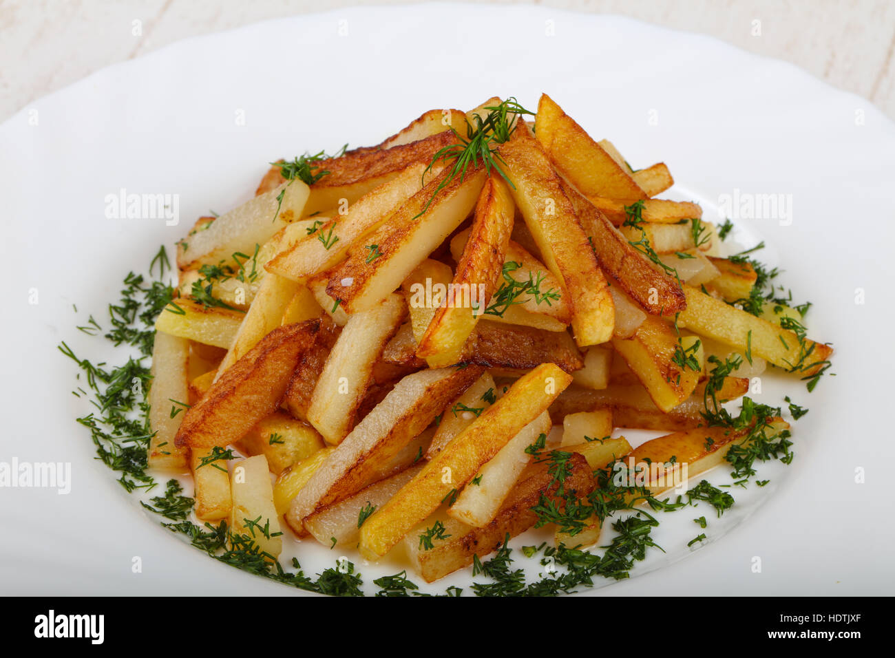 Roasted potato with dill and parsley Stock Photo Alamy