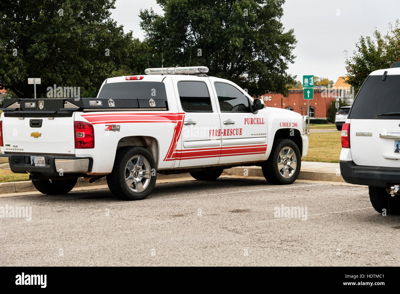 A Fire Rescue pickup truck parked in the parking lot of Purcell Public Safety Complex housing the fire and police.  Oklahoma USA Stock Photo