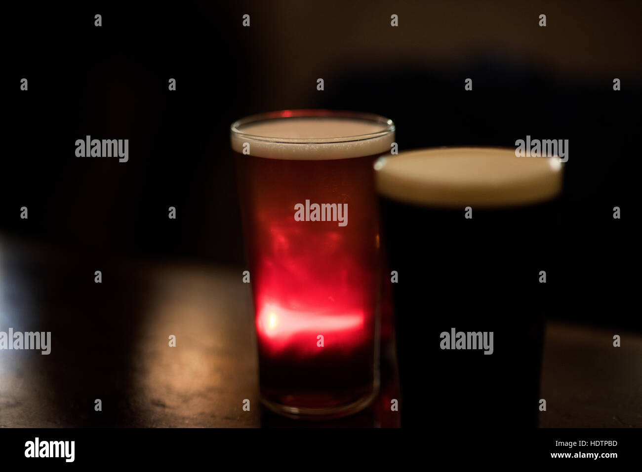 Greenwich, London England UK. Dec 2016 A pint of lager and a pint of London Stout in a Greenwich pub Stock Photo