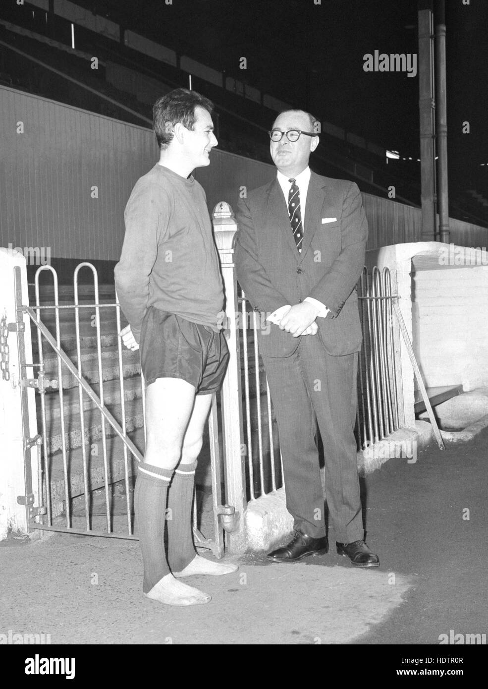 Brentford FC Captain Bobbie Ross (left) and Chairman Jack Dunnett MP in discussion at Griffin Park, following the news that Brentford may be taken over by their West London neighbours Queen's Park Rangers. Stock Photo