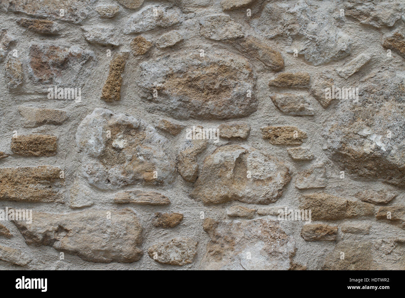 sample of old stonework wall close-up. horizontal background Stock Photo