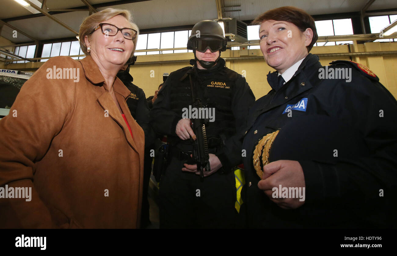 Tanaiste and Minister for Justice Frances Fitzgerald (left) and Garda Commissioner Noirin O'Sullivan (right)chat to officers as An Garda Siochana launches a new Armed Support Unit (ASU) for the Dublin region at Garda Head Quarters in Dublin. Stock Photo