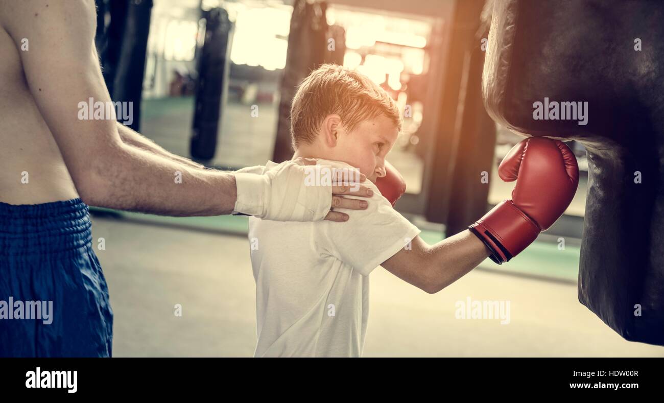 Boy Boxing Training Punching Bag Exercise Concept Stock Photo Alamy