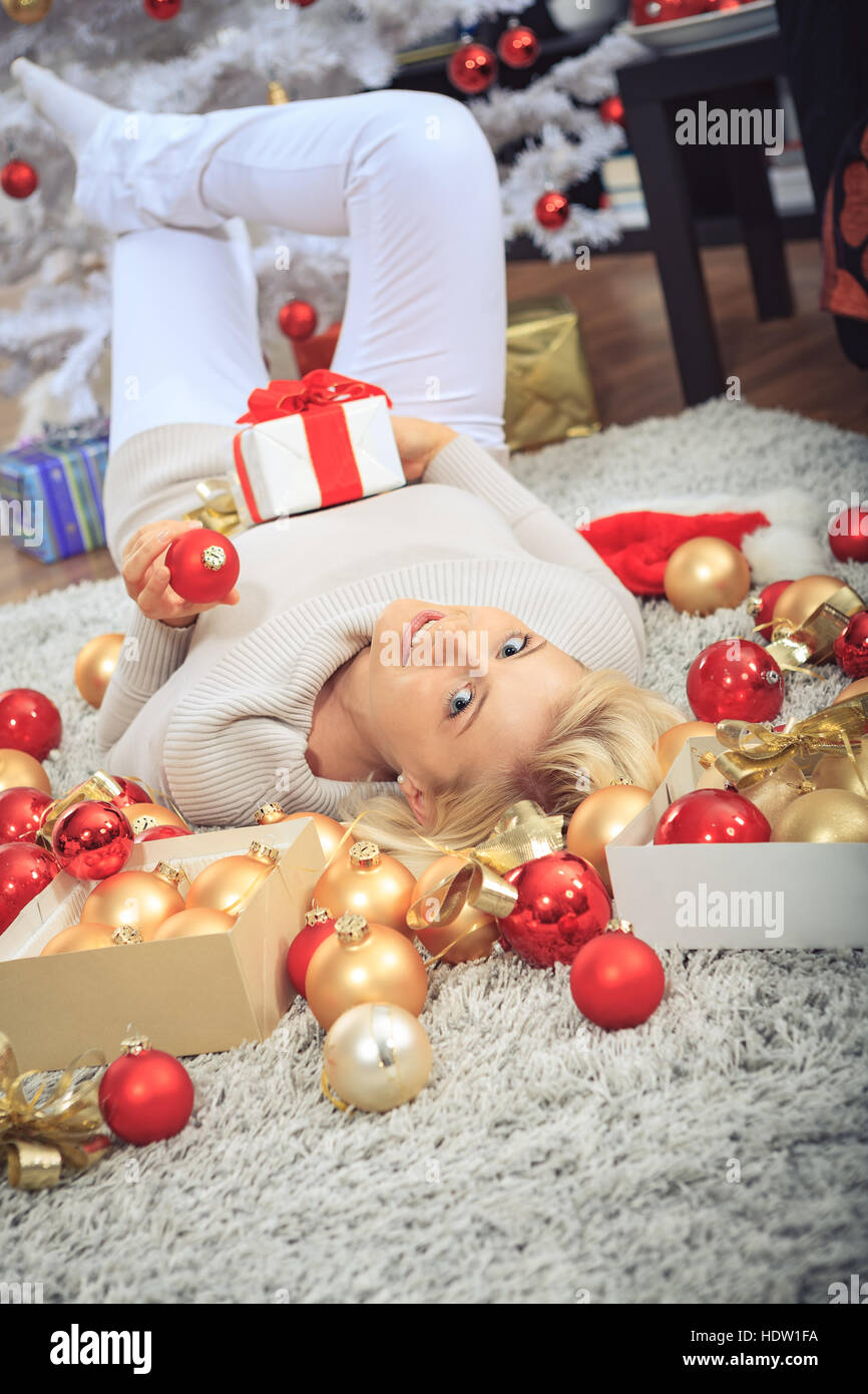a young woman geting the Christmas gift Stock Photo - Alamy