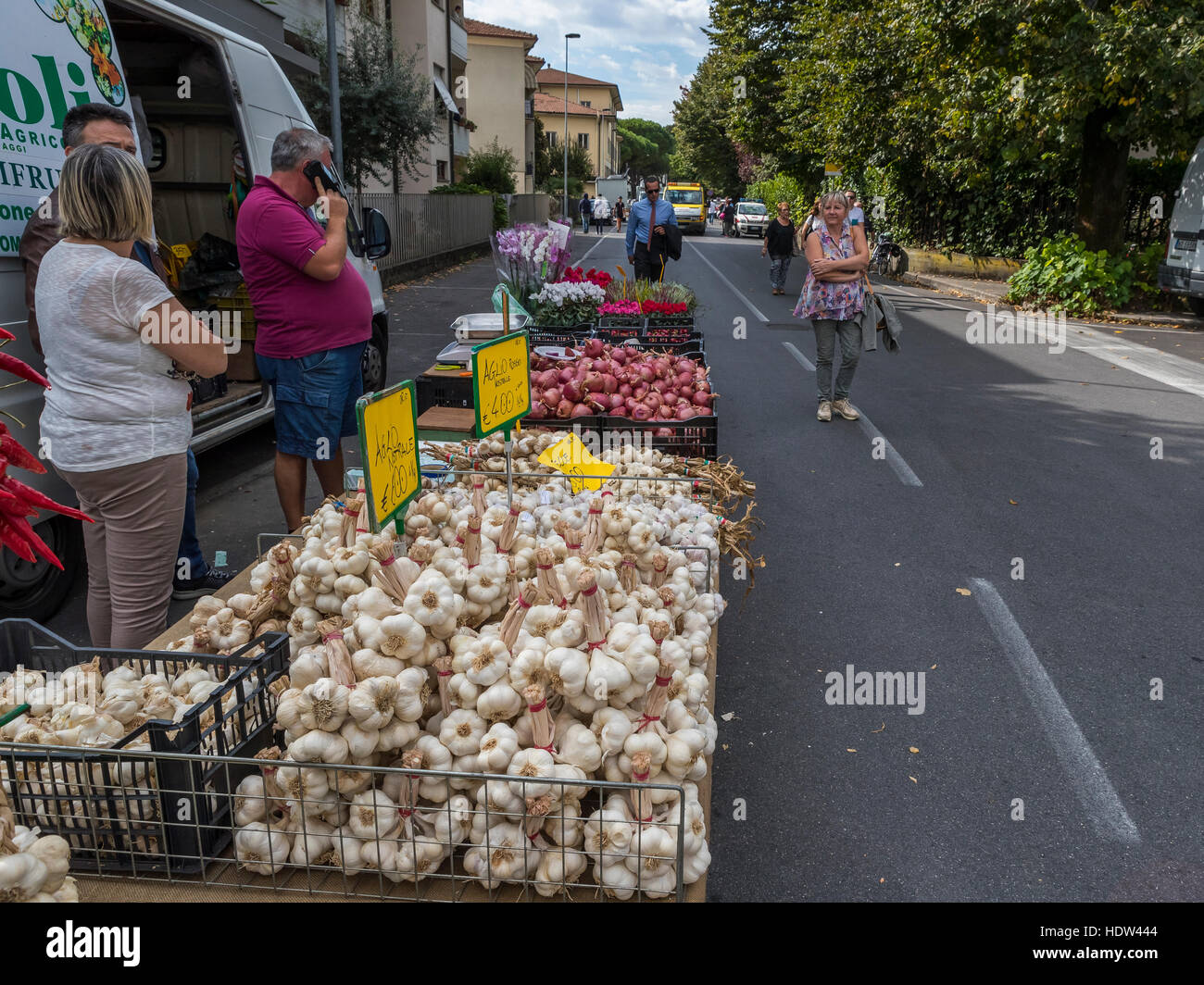 Lucca city street market stretches from the Porta Santa Maria along the Via Borga Giannotti with everything from food to pets. Stock Photo