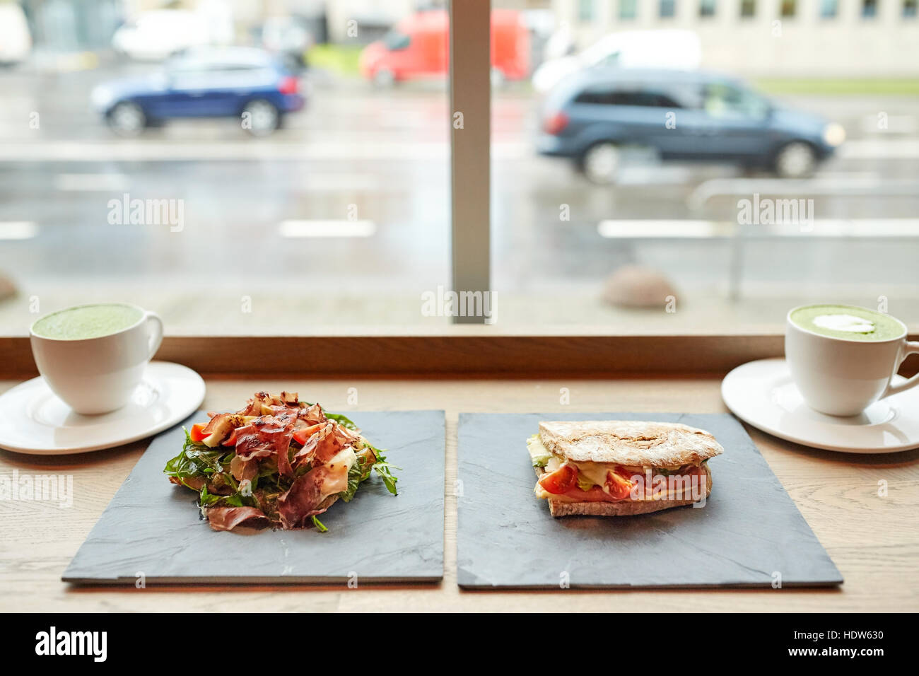 salad, sandwich and matcha green tea at restaurant Stock Photo Alamy