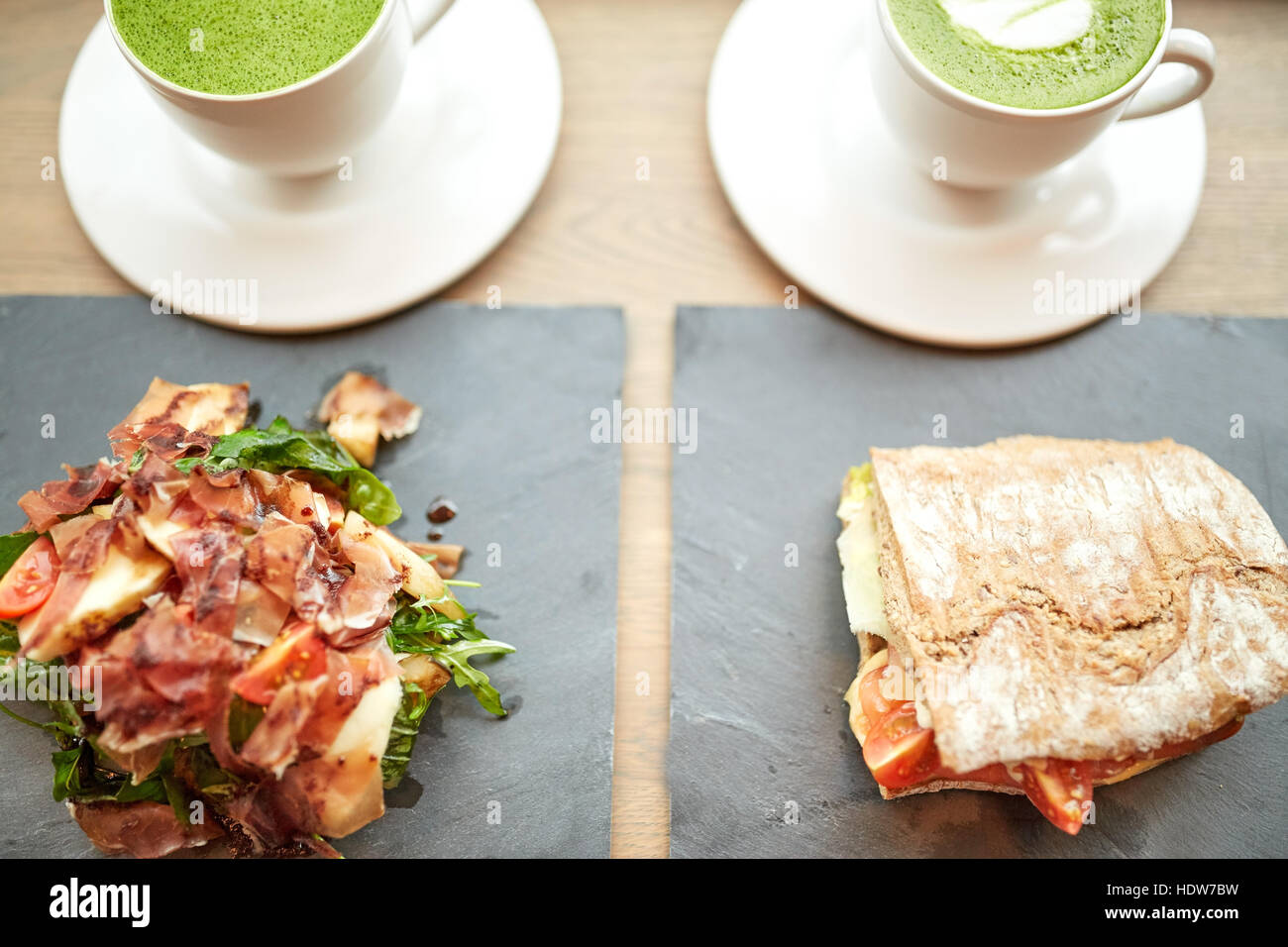 salad, sandwich and matcha green tea at restaurant Stock Photo Alamy