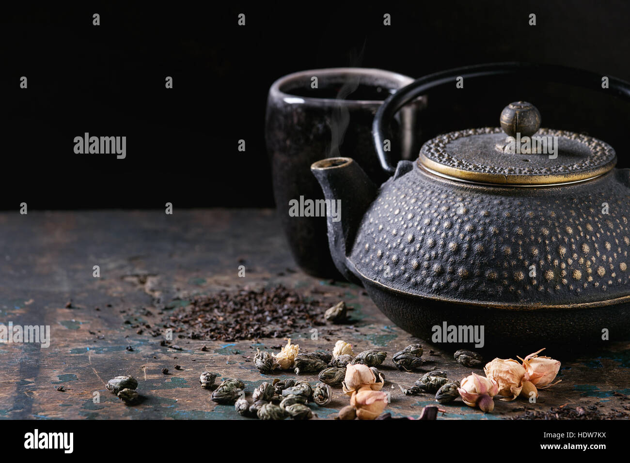 Variety of dry tea with teapot Stock Photo Alamy