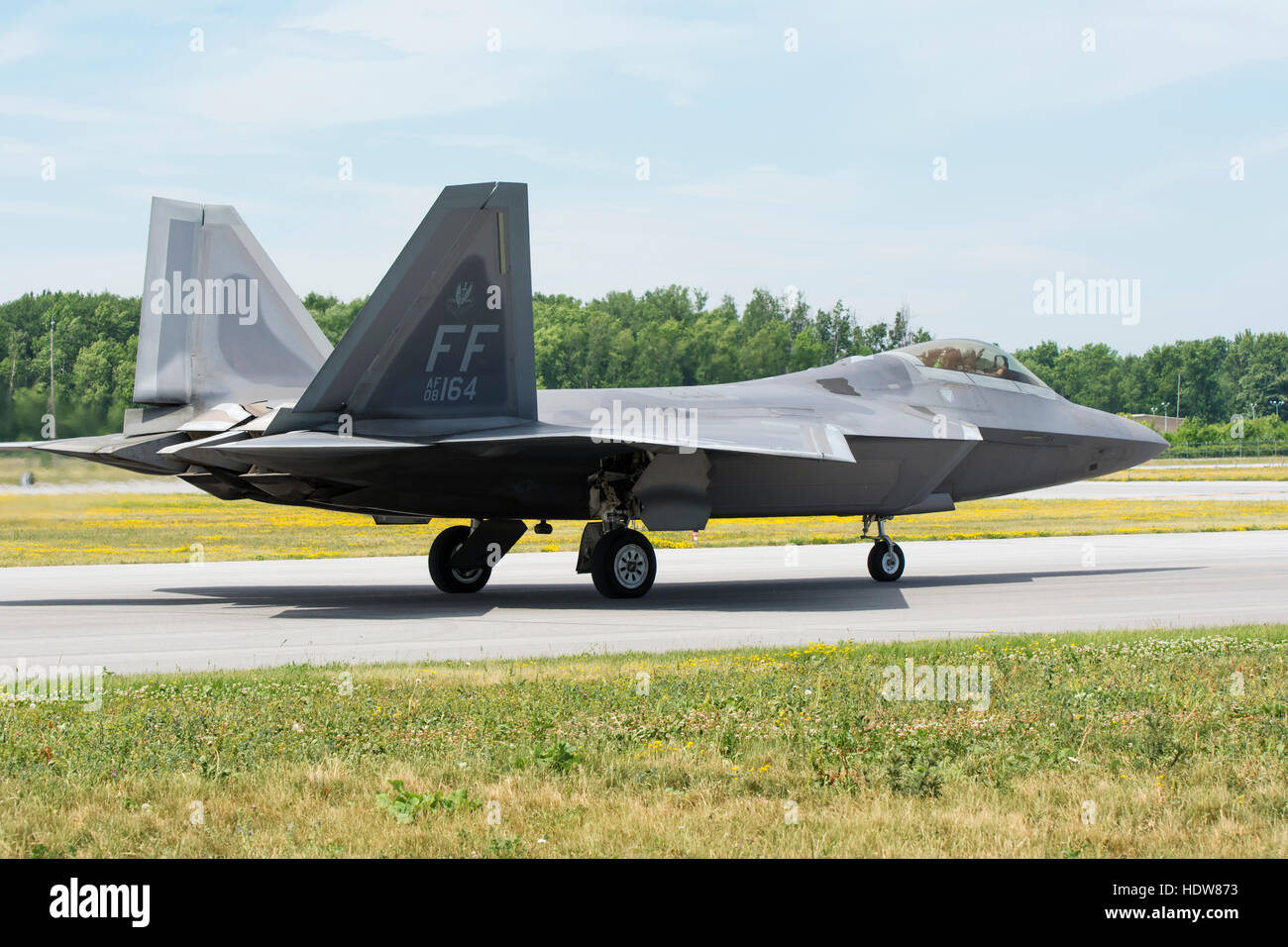 A stealth F 22 Raptor fighter jet is taxiing out for take-off; Edmonton, Alberta, Canada Stock Photo