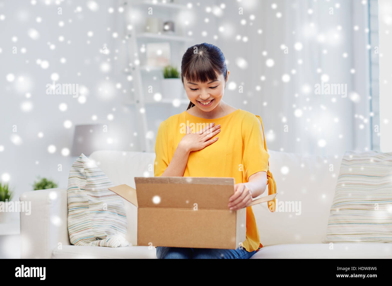 happy asian young woman with parcel box at home Stock Photo - Alamy