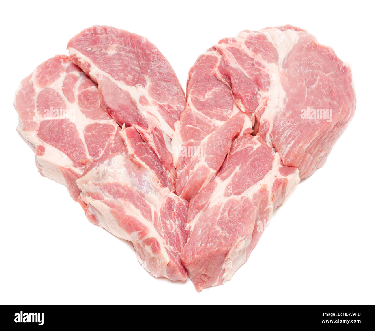 Pork meat in heart form isolated on white background Stock Photo Alamy