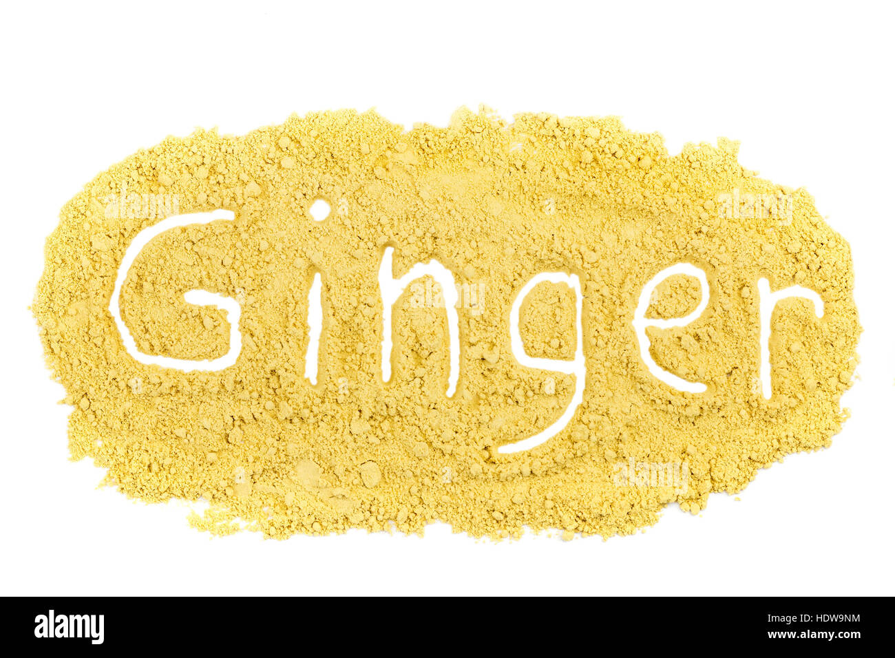 Word Ginger written in spice powder isolated on white background Stock