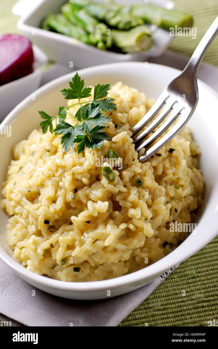 asparagus risotto with ingredients around Stock Photo Alamy
