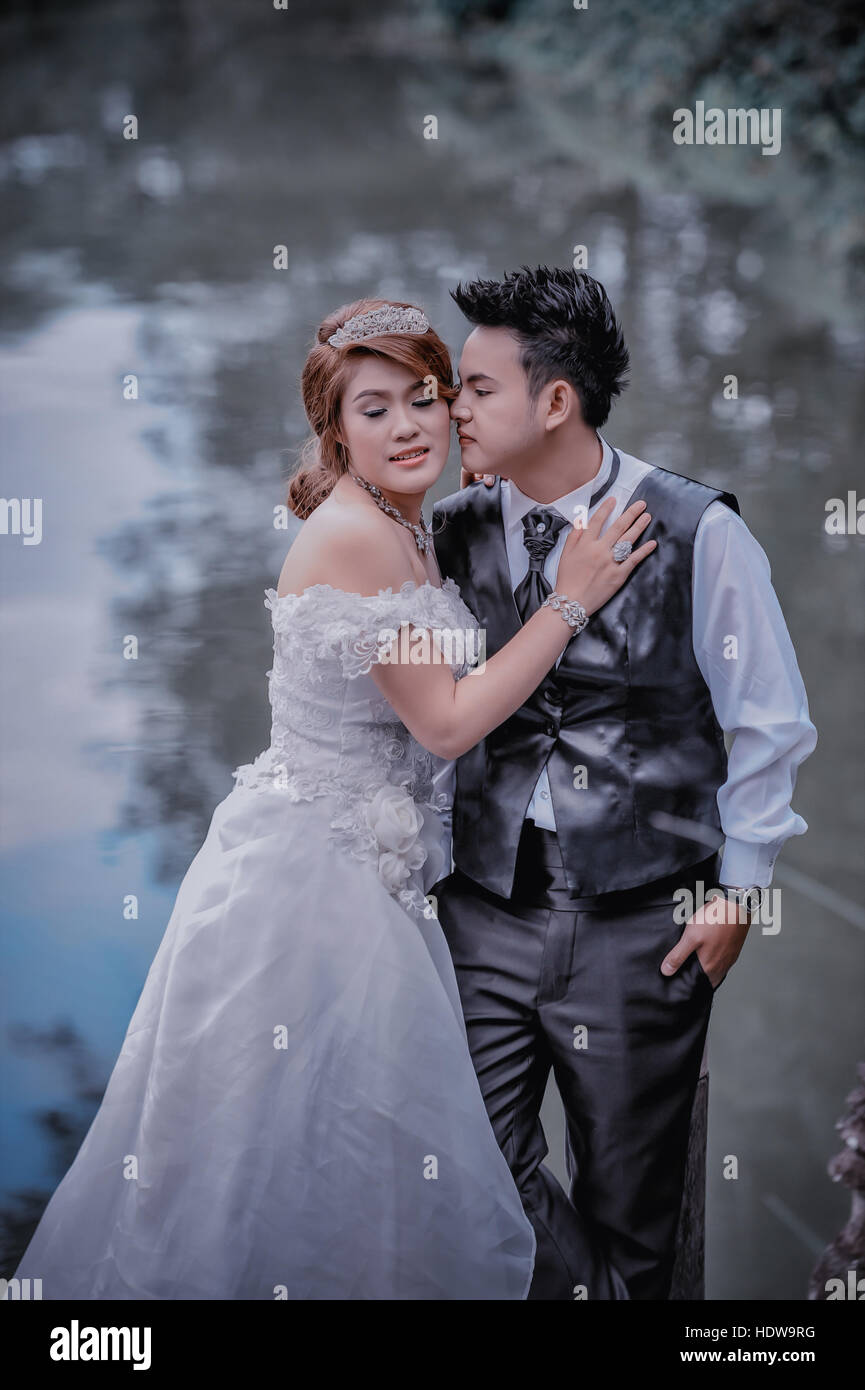 couple in love. portrait of asia young stylish fashion couple posing on  outdoor. wedding style Stock Photo - Alamy