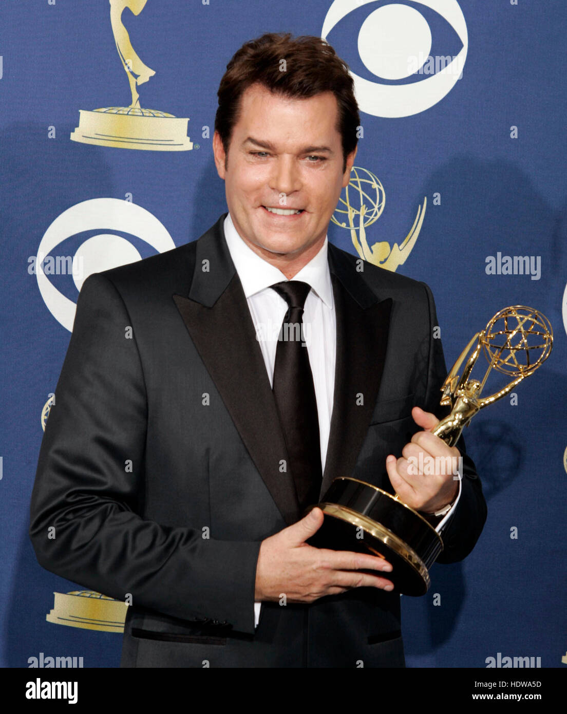 Actor Ray Liotta holds his award for outstanding guest actor in a drama series for 'ER' at the 57th Annual Emmy Awards at the Shrine Auditorium in Los Angeles, September 18, 2005. Photo by Francis Specker Stock Photo
