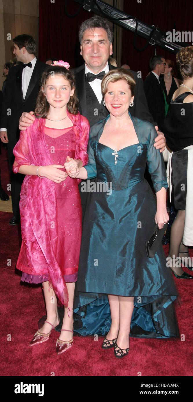 Imelda Staunton, right, husband Jim Carter, and daughter, Bessie Carter,   at the 77th Annual Academy Awards  in Los Angeles on Feb. 27, 2005. Photo credit: Francis Specker Stock Photo