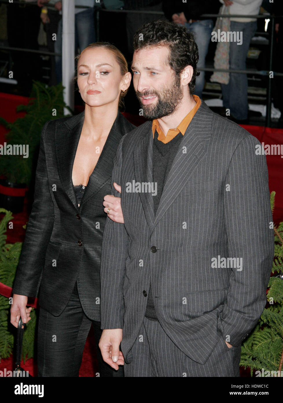 Actress Drea De Matteo and her date  arrive at the People's Choice Awards in  Pasadena, California on Sunday, 09 January, 2004. Photo credit: Francis Specker Stock Photo