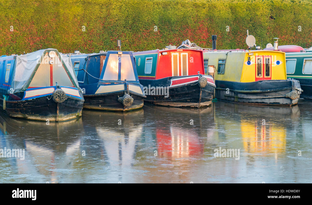 Colorful Narrowboats on a frosty winter morning, England, UK Stock Photo